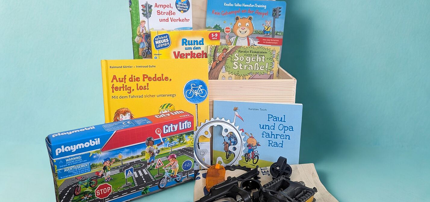 ADFC SH-"Flitzekiste" ADFC SH-"Flitzekiste" - von Playmobil bis Fahrradteile-Tastspiel